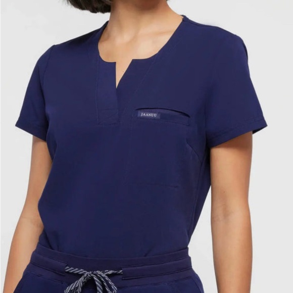 Jaanuu Women's XS Small Scrub Top Short sleeve Navy Blue 1 pocket Tuck-In J96173 - Picture 1 of 4